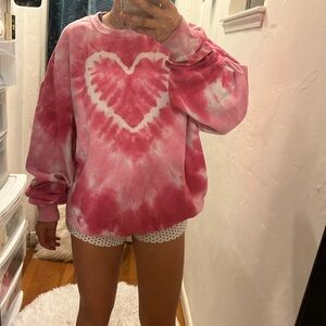 Urban outfitters pink tie dye heart crew neck. Slightly worn, good condition.